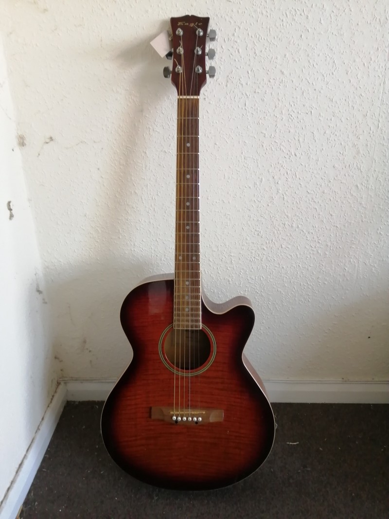 An Eagle Electro acoustic guitar, a Spanish guitar, an EKO electro acoustic guitar, with hard case and a Kimbara Electro acoustic guita